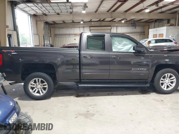 2016 Chevrolet Silverado 1500 LT with VIN 1GCVKREH3GZ137734, listed as a IAAI auction lot 41975379 with 108,704 mi miles and . Bid and sale history available at DreamBid. Image 4.