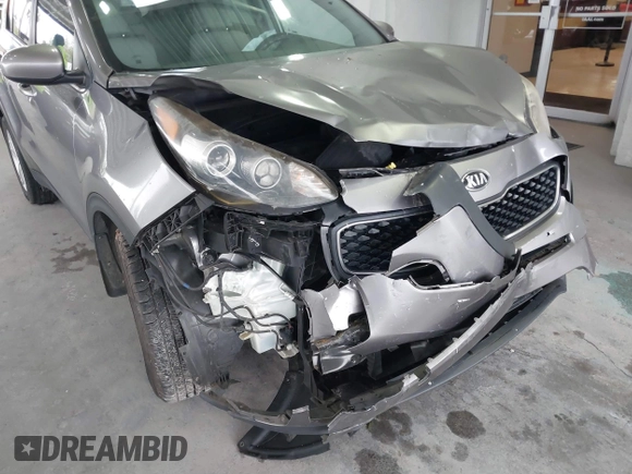 2019 Kia Sportage LX with VIN KNDPM3AC0K7561130, listed as a IAAI auction lot 41391657 with 152,728 mi miles and . Bid and sale history available at carsss.com. Image 6.