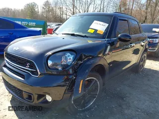 2015 MINI Countryman S with VIN WMWZC3C5XFWT04916, listed as a IAAI auction lot 41636369 with 101,448 mi miles and . Bid and sale history available at DreamBid. Image 6.