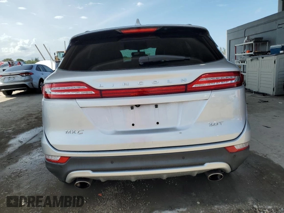 2017 Lincoln MKC Reserve with VIN 5LMCJ3C99HUL14684, listed as a Copart auction lot 58817385 with 77,005 mi miles and Salvage title. Bid and sale history available at DreamBid. Image 6.