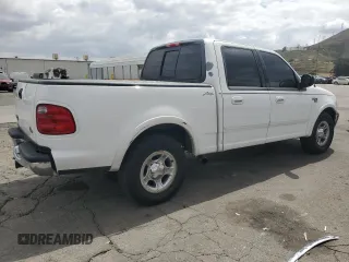 2002 Ford F-150 XLT with VIN 1FTRW07L52KA04929, listed as a Copart auction lot 54491815 with 169,132 mi miles and Salvage Title. Bid and sale history available at carsss.com. Image 3.
