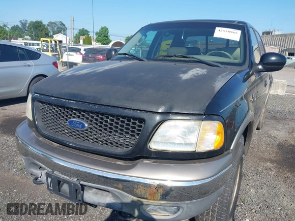 2003 Ford F-150 XLT with VIN 1FTRW08L63KC51053, listed as a IAAI auction lot 42538965 with 167,383 mi miles and . Bid and sale history available at DreamBid. Image 6.