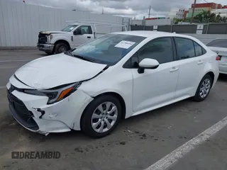 2023 Toyota Corolla Hybrid LE with VIN JTDBCMFE3PJ010097, listed as a IAAI auction lot 41786656 with 50,775 mi miles. Bid and sale history available at carsss.com. Image 2.