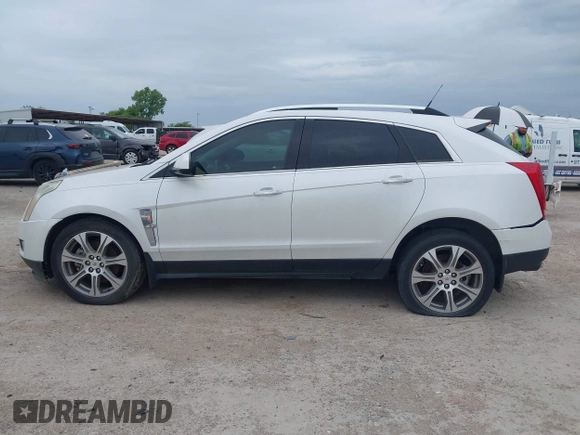 2012 Cadillac SRX Premium Collection with VIN 3GYFNCE32CS579256, listed as a IAAI auction lot 42660666 with 125,236 mi miles and . Bid and sale history available at DreamBid. Image 14.