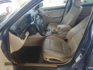 2005 BMW 3 Series 325i with VIN WBAEV33415KX10041, listed as a Copart auction lot 61673545 with 117,294 mi miles and Salvage title. Bid and sale history available at DreamBid. Image 7.