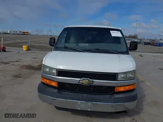 2013 Chevrolet Express Passenger 1LT with VIN 1GAZG1FA6D1191442, listed as a IAAI auction lot 41911629 with 122,796 mi miles. Bid and sale history available at carsss.com. Image 6.