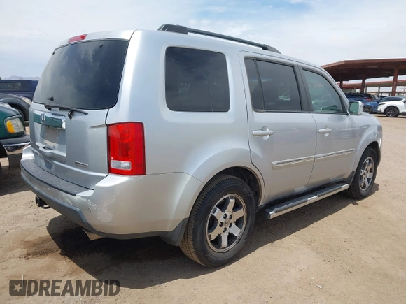 2011 Honda Pilot Touring z VIN 5FNYF3H90BB006634, wystawiony jako IAAI lot #42388390 z przebiegiem 218 475 mil mil oraz . Historia ofert i sprzedaży dostępna na DreamBid. Obrazek 4.