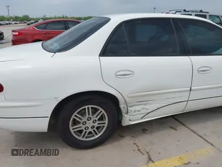 2003 Buick Regal LS with VIN 2G4WB52K231205047, listed as a IAAI auction lot 42145775 with 163,734 mi miles and . Bid and sale history available at DreamBid. Image 6.
