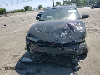 2024 Dodge Hornet R/T Plus z VIN ZACPDFDW4R3A14678, wystawiony jako Copart lot #57875455 z przebiegiem 5 215 mil mil oraz Szkoda całkowita • Salvage title. Historia ofert i sprzedaży dostępna na DreamBid. Obrazek 14.
