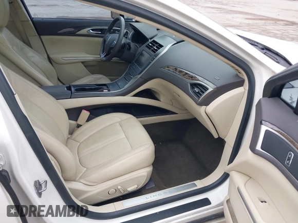 2013 Lincoln MKZ z VIN 3LN6L2GK9DR811737, wystawiony jako IAAI lot #42011896 z przebiegiem 100 669 mil mil oraz . Historia ofert i sprzedaży dostępna na DreamBid. Obrazek 5.