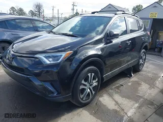 2018 Toyota RAV4 LE with VIN 2T3ZFREV9JW457062, listed as a IAAI auction lot 41696609 with 96,716 mi miles. Bid and sale history available at carsss.com. Image 20.