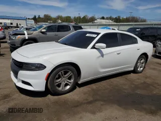 2015 Dodge Charger SE z VIN 2C3CDXBG8FH716920, wystawiony jako Copart lot #54009615 z przebiegiem 135 239 mil mil oraz Szkoda całkowita • Salvage title. Historia ofert i sprzedaży dostępna na DreamBid. Obrazek 1.