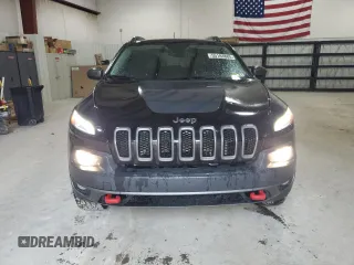 2016 Jeep Cherokee Trailhawk with VIN 1C4PJMBS7GW337774, listed as a Copart auction lot 55184885 with 161,567 mi miles and Salvage title. Bid and sale history available at DreamBid. Image 5.