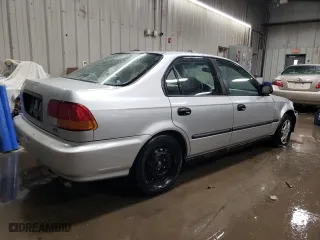 1997 Honda Civic DX with VIN 1HGEJ6624VL021651, listed as a Copart auction lot 86190384 with 135,159 mi miles and Salvage Title. Bid and sale history available at carsss.com. Image 3.