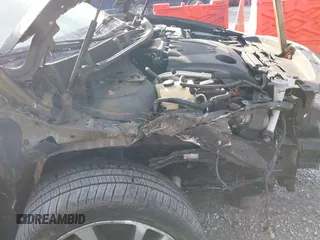 2016 Nissan Maxima SL z VIN 1N4AA6AP9GC385718, wystawiony jako IAAI lot #41099349 z przebiegiem 108 841 mil mil oraz . Historia ofert i sprzedaży dostępna na DreamBid. Obrazek 6.
