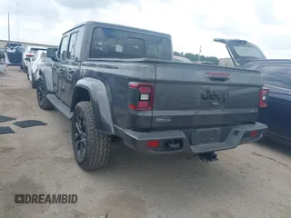 2021 Jeep Gladiator Overland with VIN 1C6HJTFG4ML617175, listed as a IAAI auction lot 42148031 with 70,627 mi miles and . Bid and sale history available at DreamBid. Image 3.