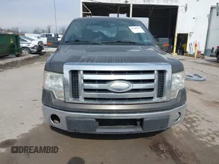 2009 Ford F-150 XL with VIN 1FTPF12V79KC35637, listed as a IAAI auction lot 41645222 with 169,114 mi miles. Bid and sale history available at carsss.com. Image 6.