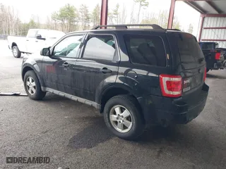 2009 Ford Escape XLT with VIN 1FMCU93G79KC30405, listed as a IAAI auction lot 42043034 with 136,086 mi miles. Bid and sale history available at carsss.com. Image 3.