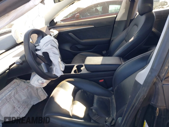 2021 Tesla Model 3 Standard Range Plus z VIN 5YJ3E1EA1MF059829, wystawiony jako IAAI lot #41700782 z przebiegiem 36 813 mil mil oraz . Historia ofert i sprzedaży dostępna na DreamBid. Obrazek 5.
