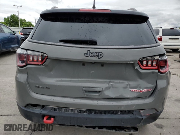 2021 Jeep Compass Trailhawk with VIN 3C4NJDDB9MT594344, listed as a Copart auction lot 58821455 with 80,039 mi miles and Salvage title. Bid and sale history available at DreamBid. Image 6.