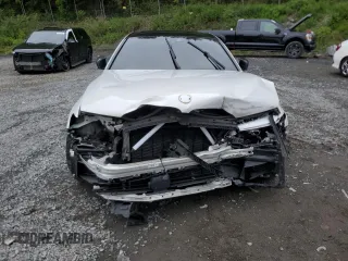 2019 BMW 5 Series M550i xDrive with VIN WBAJB9C54KB288569, listed as a Copart auction lot 58707235 with Not provided miles and Salvage title. Bid and sale history available at DreamBid. Image 5.