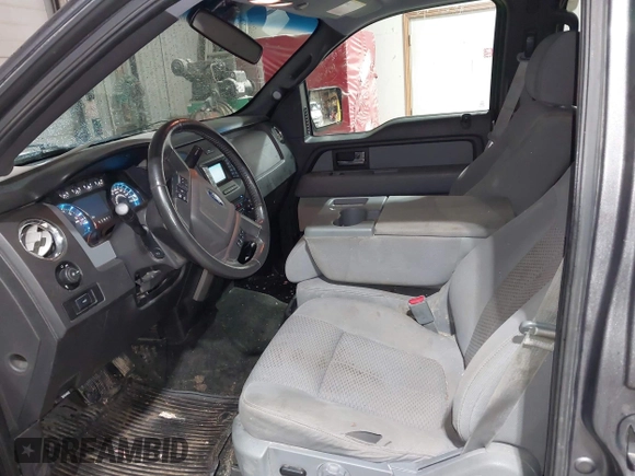 2014 Ford F-150 XL with VIN 1FTFW1EF5EFB71651, listed as a IAAI auction lot 42051456 with 143,945 mi miles and . Bid and sale history available at DreamBid. Image 14.