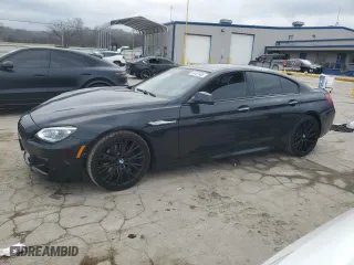 2015 BMW 6 Series 650i with VIN WBA6B2C50FD799106, listed as a Copart auction lot 44463985 with 74,969 mi miles and Salvage Title. Bid and sale history available at carsss.com. Image 1.