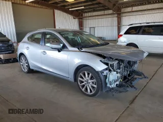 2017 Mazda 3 Touring with VIN 3MZBN1L79HM113024, listed as a Copart auction lot 55831015 with 102,267 mi miles and Salvage title. Bid and sale history available at DreamBid. Image 4.