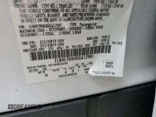 2013 Lincoln MKS with VIN 1LNHL9DK4DG612981, listed as a Copart auction lot 60701895 with 113,354 mi miles and Salvage title. Bid and sale history available at DreamBid. Image 12.