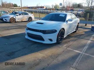 2020 Dodge Charger Scat Pack Widebody z VIN 2C3CDXGJ3LH244092, wystawiony jako IAAI lot #41828294 z przebiegiem 107 568 mil mil oraz . Historia ofert i sprzedaży dostępna na DreamBid. Obrazek 2.