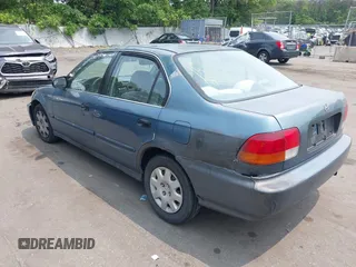1997 Honda Civic LX z VIN 2HGEJ6675VH533072, wystawiony jako IAAI lot #42429892 z przebiegiem 189 713 mil mil oraz . Historia ofert i sprzedaży dostępna na DreamBid. Obrazek 3.