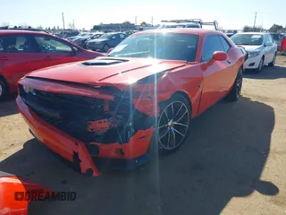 2016 Dodge Challenger R/T Scat Pack z VIN 2C3CDZFJ2GH345692, wystawiony jako IAAI lot #41686233 z przebiegiem 120 723 mil mil oraz . Historia ofert i sprzedaży dostępna na DreamBid. Obrazek 2.