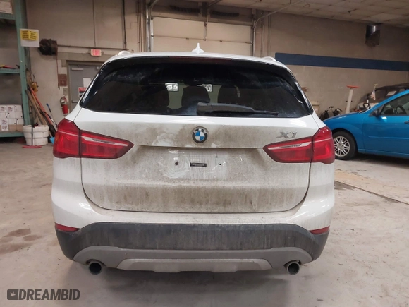 2016 BMW X1 xDrive28i with VIN WBXHT3C30G5E52065, listed as a IAAI auction lot 41552781 with 205,961 mi miles. Bid and sale history available at carsss.com. Image 15.