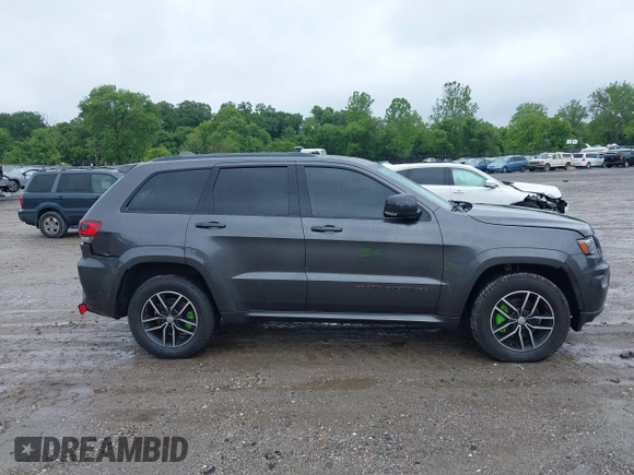 2017 Jeep Grand Cherokee Trailhawk with VIN 1C4RJFLG2HC645209, listed as a IAAI auction lot 42348470 with 170,905 mi miles and . Bid and sale history available at DreamBid. Image 13.