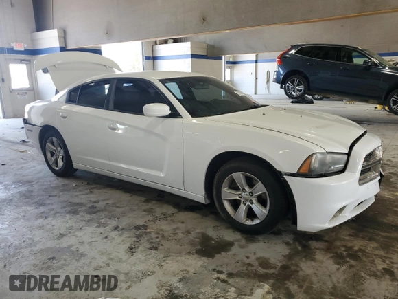 2012 Dodge Charger SE with VIN 2C3CDXBG1CH146027, listed as a Copart auction lot 55129565 with 219,879 mi miles and Salvage Title. Bid and sale history available at DreamBid. Image 4.