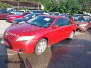 2007 Toyota Camry CE with VIN 4T1BE46K37U106127, listed as a IAAI auction lot 42088929 with 241,810 mi miles. Bid and sale history available at carsss.com. Image 2.