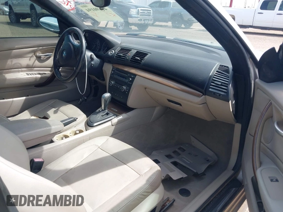 2009 BMW 1 Series 128i with VIN WBAUL73529VJ74898, listed as a IAAI auction lot 42690194 with 134,407 mi miles and . Bid and sale history available at DreamBid. Image 5.