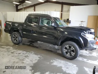 2019 Toyota Tacoma SR z VIN 5TFCZ5AN1KX196812, wystawiony jako Copart lot #51372065 z przebiegiem Nie podano mil oraz Szkoda całkowita • Salvage title. Historia ofert i sprzedaży dostępna na DreamBid. Obrazek 4.