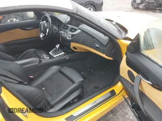 2011 BMW Z4 sDrive35i with VIN WBALM7C58BE383383, listed as a IAAI auction lot 41381714 with 55,704 mi miles. Bid and sale history available at carsss.com. Image 5.