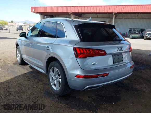 2018 Audi Q5 Premium Plus z VIN WA1BNAFY9J2055656, wystawiony jako IAAI lot #42187509 z przebiegiem 74 572 mil mil oraz . Historia ofert i sprzedaży dostępna na DreamBid. Obrazek 3.