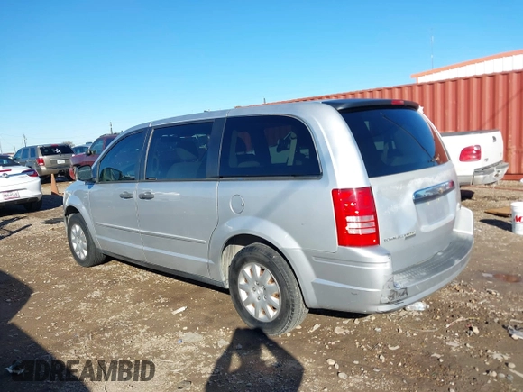 2008 Chrysler Town & Country LX with VIN 2A8HR44H38R115587, listed as a IAAI auction lot 41035823 with 167,564 mi miles and . Bid and sale history available at DreamBid. Image 14.