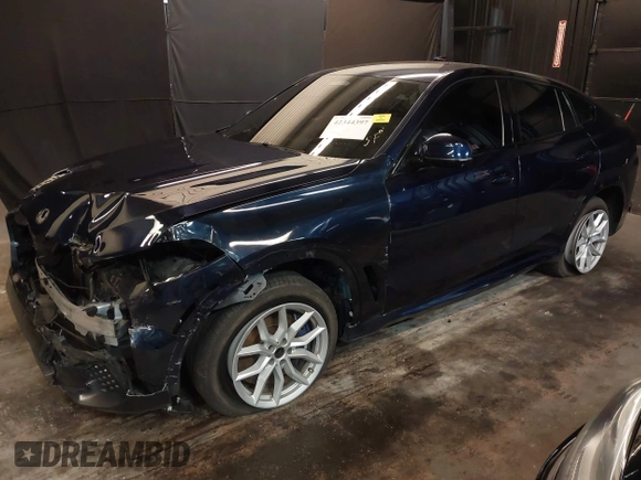 2022 BMW X6 M50i z VIN 5UXCY8C05N9J70601, wystawiony jako IAAI lot #42344397 z przebiegiem 49 085 mil mil oraz . Historia ofert i sprzedaży dostępna na DreamBid. Obrazek 20.