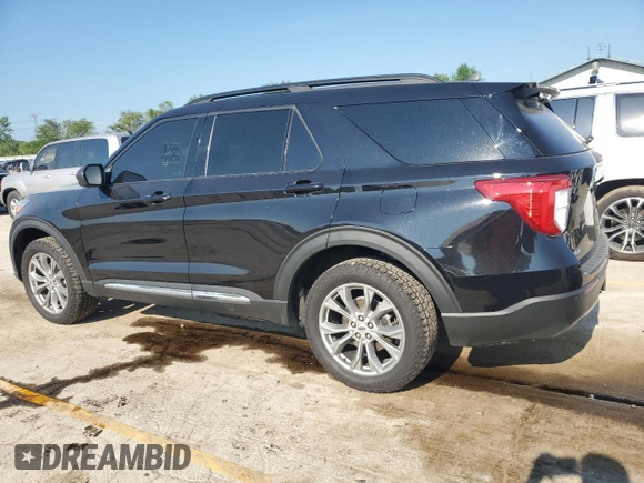 2023 Ford Explorer XLT with VIN 1FMSK8DH7PGB08372, listed as a Copart auction lot 62395205 with 63,257 mi miles and Salvage title. Bid and sale history available at DreamBid. Image 2.