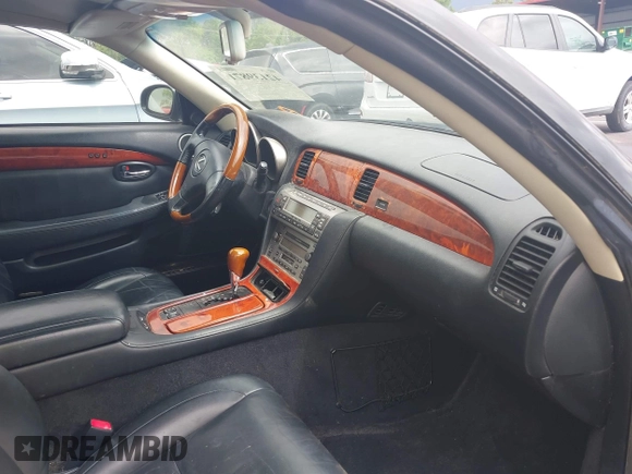 2004 Lexus SC with VIN JTHFN48Y940059470, listed as a IAAI auction lot 42139871 with 184,558 mi miles. Bid and sale history available at carsss.com. Image 5.