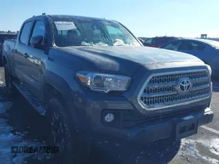 2017 Toyota Tacoma SR5 with VIN 3TMDZ5BN6HM013986, listed as a IAAI auction lot 41418609 with 101,924 mi miles. Bid and sale history available at carsss.com. Image 1.