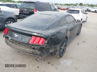 2016 Ford Mustang EcoBoost z VIN 1FA6P8THXG5267039, wystawiony jako IAAI lot #42014319 z przebiegiem 103 936 mil mil oraz . Historia ofert i sprzedaży dostępna na DreamBid. Obrazek 4.