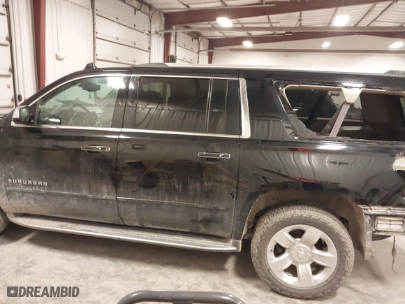 2017 Chevrolet Suburban Premier with VIN 1GNSKJKC0HR250854, listed as a IAAI auction lot 41541476 with 128,231 mi miles. Bid and sale history available at carsss.com. Image 14.