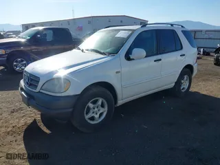 2001 Mercedes-Benz M-Class with VIN 4JGAB54E01A257846, listed as a IAAI auction lot 42010998 with 194,597 mi miles. Bid and sale history available at carsss.com. Image 17.