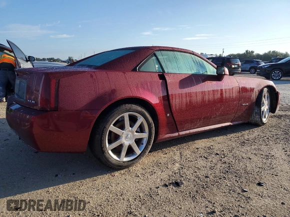 2007 Cadillac XLR z VIN 1G6YV36A775600889, wystawiony jako Copart lot #74500024 z przebiegiem Nie podano mil oraz Szkody całkowita. Historia ofert i sprzedaży dostępna na DreamBid. Obrazek 3.