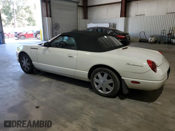 2002 Ford Thunderbird Hardtop Premium with VIN 1FAHP60A32Y125580, listed as a Copart auction lot 77493514 with 74,619 mi miles and Salvage Title. Bid and sale history available at DreamBid. Image 2.